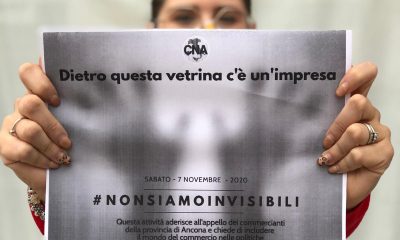 Foto slogan dell'iniziativa Cna "non siamo invisibili"