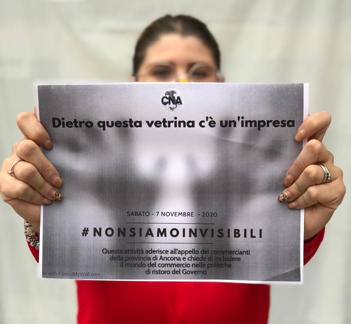 Foto slogan dell'iniziativa Cna "non siamo invisibili"